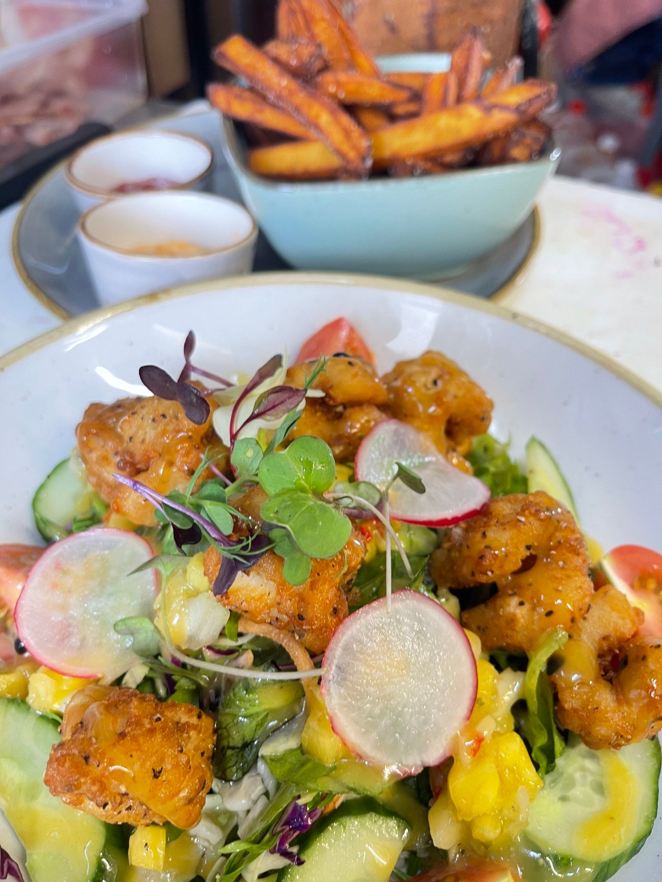 Crispy squid salad with kumara fries