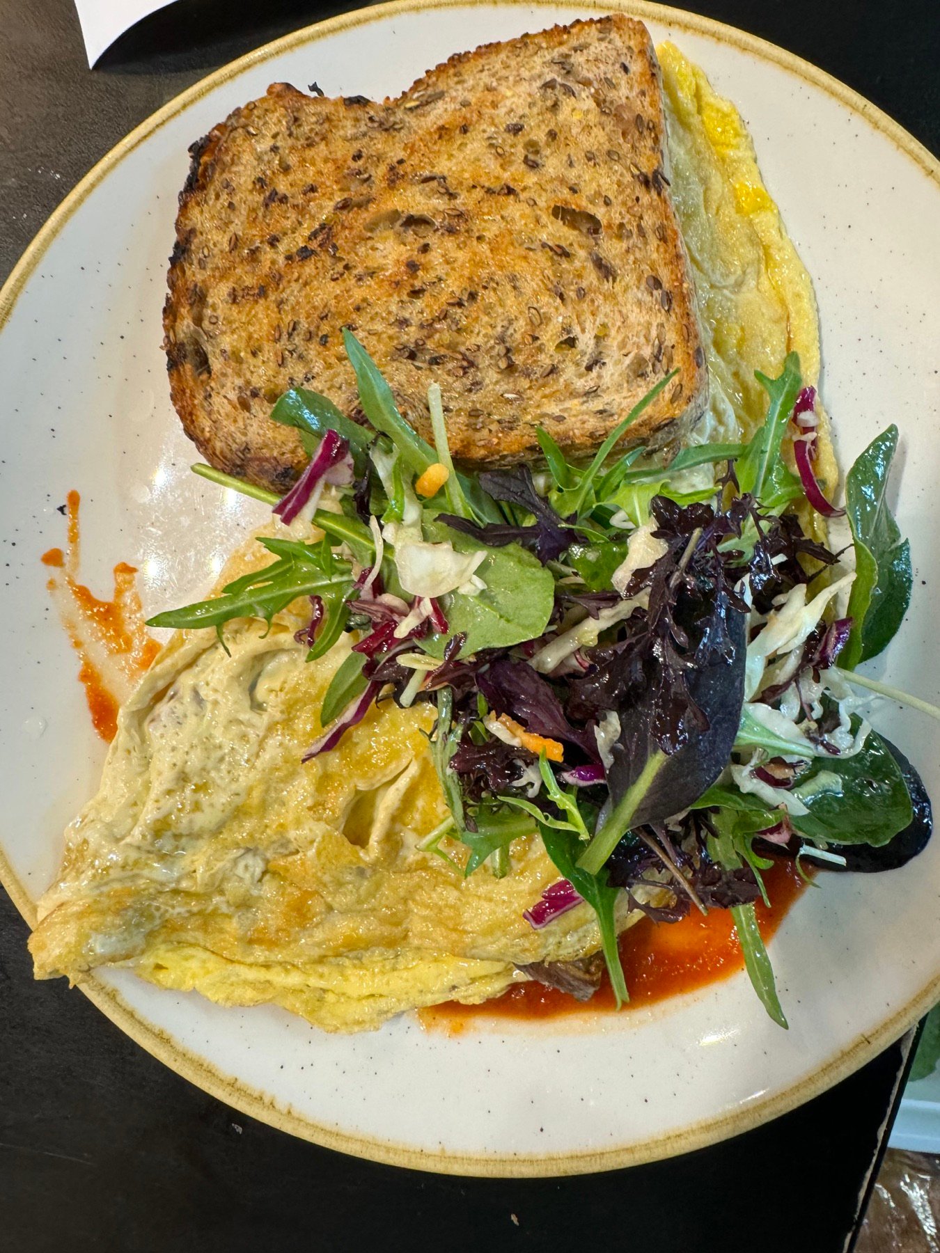 Omelette, toast and garden salad